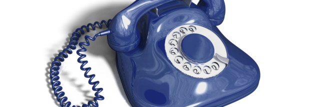 Ein blaues Telefon mit Wählscheibe